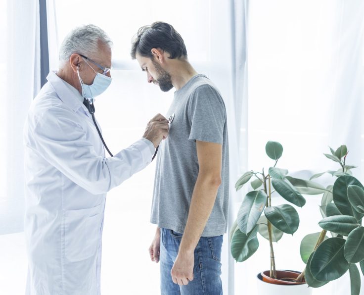 doctor-examining-chest-patient